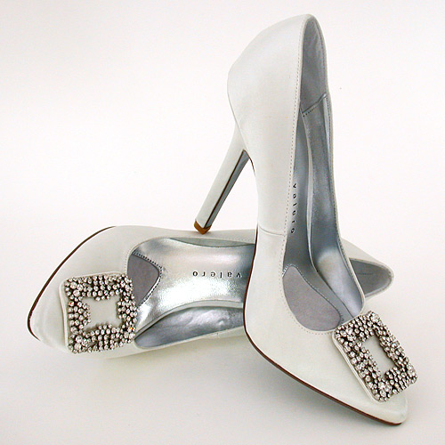 From the moment we saw these precious ivory shoes on Caroline Tran's website