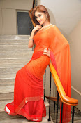 Sony Charista Glamorous in Saffron saree-thumbnail-7