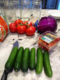 cucumbers , tomatoes, and mason jars