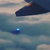 UFO With Blue Light In Clouds Filmed From Plane Window