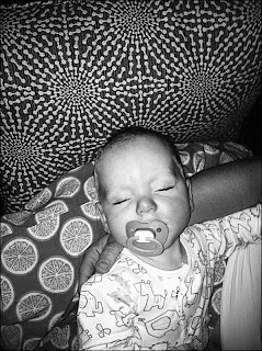 sleeping baby with nuk