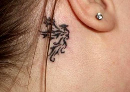Ya gotta love this classy ear phoenix tattoo design jeeez methinks I wud