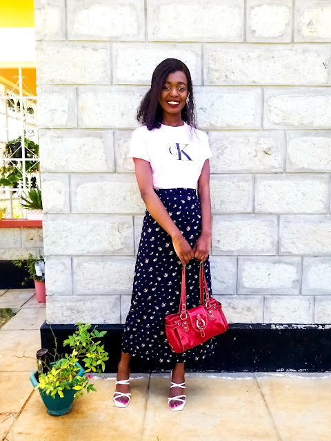 How To Wear A Midi Skirt With A Graphics T-Shirt