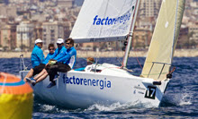 J/80 one-design sailboat- sailing upwind at Worlds.