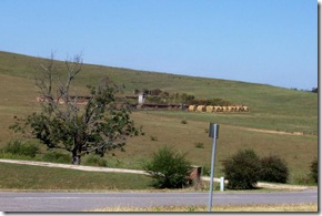 McDowell family cemetery located within brick wall surrounding it.