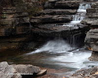A photograph of the waterfall caused by the Lake Ann Spillway.