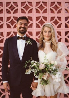 Grace Helbig with her husband Elliott Morgan in their wedding dress
