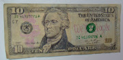 Paul redrew a one dollar bill as a ten dollar bill.