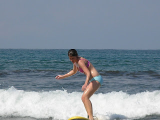 Molly surfing in Costa Rica