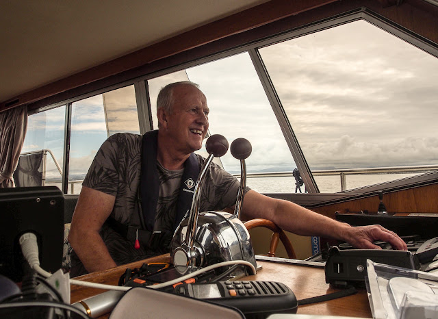 Photo of Phil at the helm