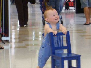 Image: Baby running off with a chair. Photo Credit: Jasmine Adams on FreeImages