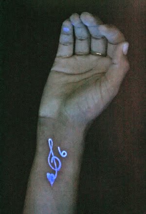 Black light tattoos, those that are visible only under ultraviolet light and 