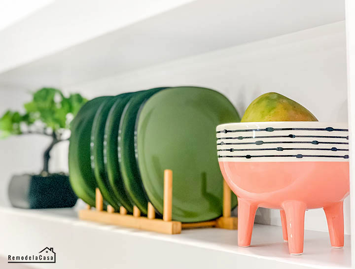 green dishes and pink footed bowl