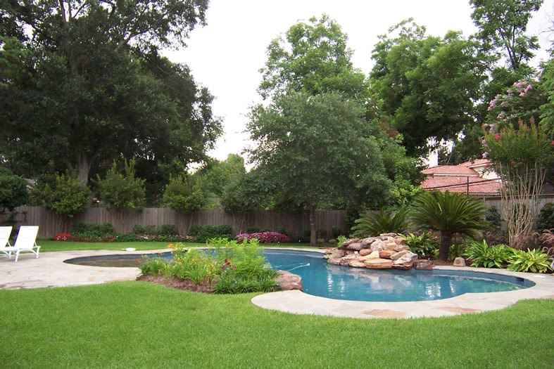 Modern residential landscaping around swimming pool