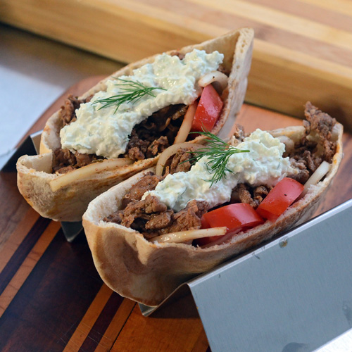 Shaved steak gyros with tzatziki sauce