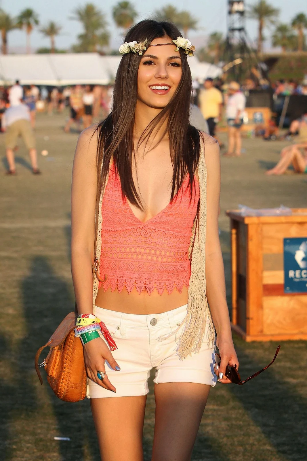 Victoria Justice shows off cleavage in a lace cropped top at the 2014 Coachella Music and Arts Festival