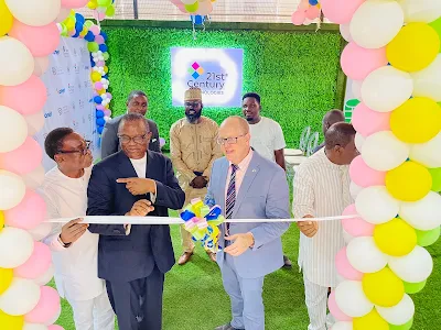U.S. Consul General, Mr. Will Stevens (second right) with Chairman & CEO, 21st Century Technologies Group, Wale Ajisebutu, (second left), during the official opening ceremony of the Digital Expert Academy in Lagos on Monday @ITREALMS