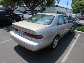 1999 Camry has panels with different colors & peeling clear coat.