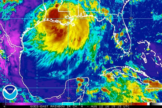 Enhanced infrared satellite image for the central Gulf Coast reveals the vast scope of the area of low pressure generating torrential rains in southeast Louisiana, 12 August 2016. Graphic: NOAA/NESDIS