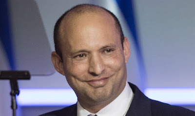 PM Naftali Bennett smiling