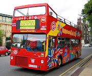 . we were also able to board the opentop bus to take us on our tour. (tourbus)