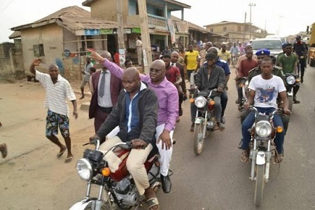 Wow! See Gov. Fayose Riding on Okada As He Inspects Newly-installed Water Taps in Ekiti Community (Photos)