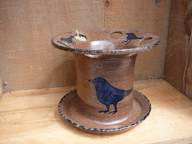 toothbrush holder with crow