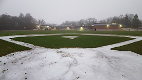 baseball field at the Parmenter School early this morning in the mixed precipitation