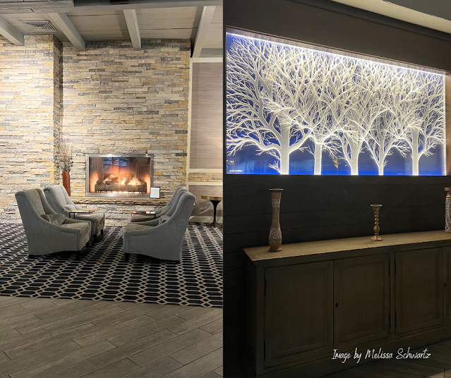 A fireplace and beautiful artwork create a relaxing ambiance in the lobby of The Abbey Resort.