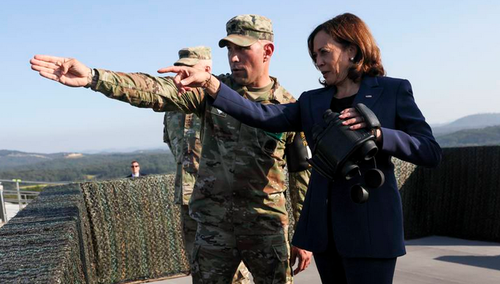 U.S. Vice President Kamala Harris, right, uses binoculars at the military observation post as she visits the Demilitarized Zone separating the two Koreas in Panmunjom, South Korea, on Sept. 29, 2022. (Leah Millis/AP)