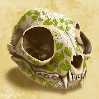 Cat skull decorated with wasabi leaves and flower