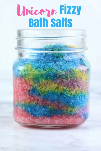 This bath salts diy is like a bath salt in a jar.  These bath salts homemade fizz when they hit the water!  Bath salts homemade with layered colors for a unicorn theme.  Making bath salts is easy with this fizzy bath salts recipe.  Fizzy bath salts diy with essential oils.  #fizzy #bathsalts #bathsalt #diy #unicorn