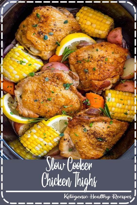 Slow cooker chicken thighs served with hearty vegetables is a complete meal made easy! Tender pieces of chicken, potatoes, carrots, and corn, all simmered in a lemon garlic herb sauce. #slowcooker #crockpot #chickenrecipes #chickenthighs