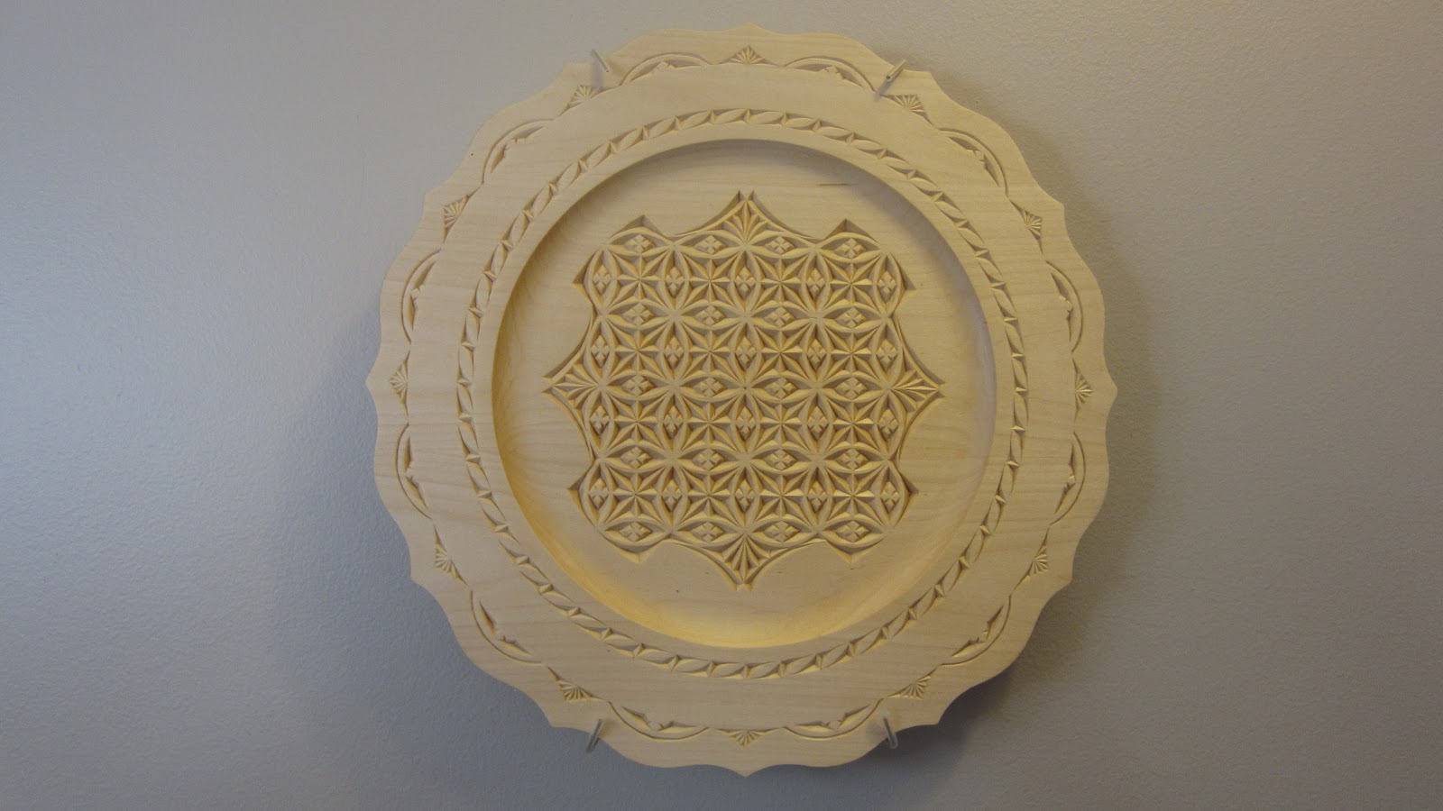 Ales the woodcarver: Chip carved basswood plate