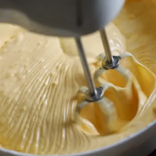 mixing cream and mango