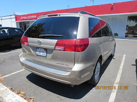 Dented & scraped Toyota Sienna after collision repair.