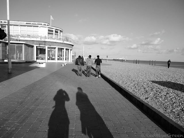 photo of walking path, cafe, shops at Brighton beach