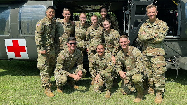 During orientation, helicopters landed on the softball field, and students were taught about air medical evacuations. (Brandenburg is in the back row, second from left.) (Photo credit: Courtesy of 2LT Patrick Brandenburg, USU)