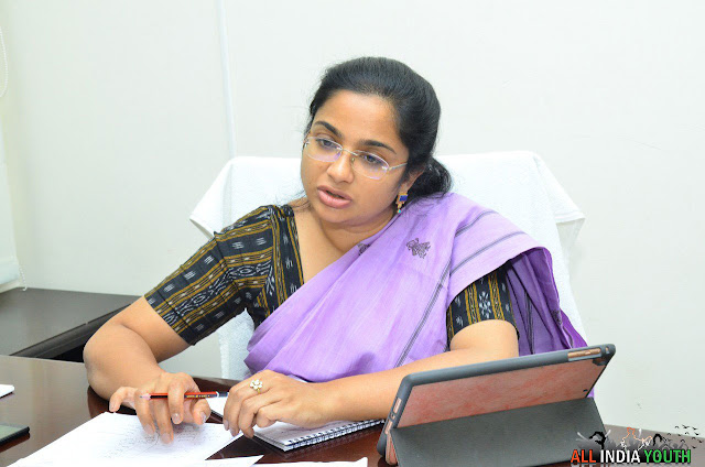 Swetha Mohanty Wanaparthy District Collector with her Tab in the office