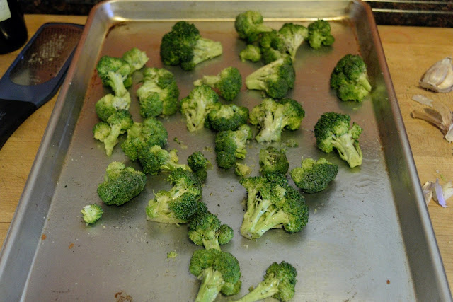 Broccoli florets ready to go into the oven to roast.