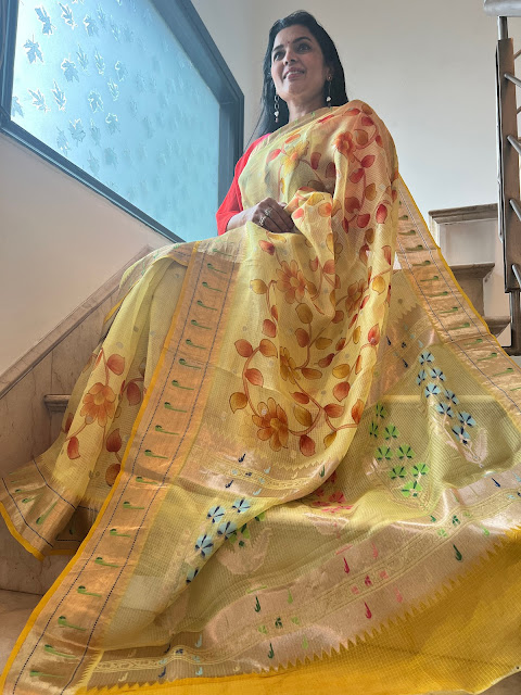 Gold hand painted Kota saree with a muniva border