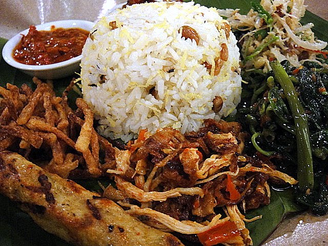The Uma's specialty is "Nasi Ratus," a platter of black ...