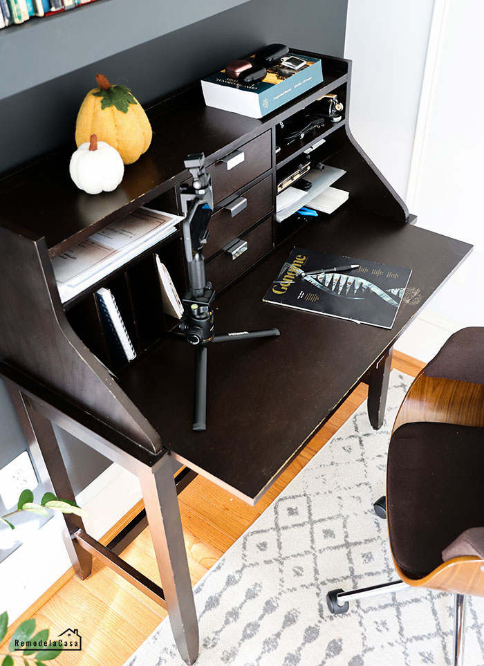 dark desk with cubbies and little drawers