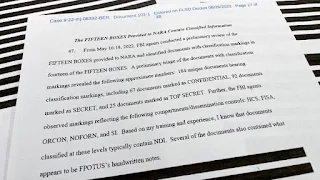 US Department of Justice: Secret documents stashed with Trump to obstruct investigation A report issued by the US Department of Justice accused former President Donald Trump's team of obstructing investigations into confidential documents confiscated at his residence, while the latter demands the appointment of a third party to examine the documents.  A report issued by the US Department of Justice confirmed that files seized at the residence of former US President Donald Trump in Florida were "probably hidden" to obstruct the investigation targeting him.  The procedural document issued on Tuesday night, Wednesday, explains, in the most detailed form so far, the motives behind the FBI's search of the former president's residence on August 8, to seize very secret files that he did not hand over after leaving the White House despite his requests to do so several times.  The document asserts that before carrying out the operation, the US Federal Police found "a number of evidence" confirming that "classified classified files" are still located at Trump's residence in Mar-a-Lago.  She added that "the government has also obtained evidence that there are government files that may have been hidden and taken... and that actions may have taken place to obstruct the investigation."  In this context, the document revealed that Trump's lawyers "explicitly prohibited government employees from opening or looking inside any of the boxes" in the storage room, when FBI agents first traveled to the Mar-a-Lago resort in June to retrieve the records.  In its filing to the US District Court in the Southern District of Florida, the department said the government also found evidence that "government records may have been concealed and removed from the storage room in an effort likely to obstruct the government's investigation."  On the last page, the US Department of Justice attached the document with a picture of files seized by the Federal Police marked "Top Secret".  The department said it explained the measures that led to the raid in order to "correct the incomplete and inaccurate account presented in Trump's statements."  The department's statement came in response to Trump's demand, last week, that files seized by the Federal Police at his residence be examined by an independent third party, at a time when Trump considers that the government is persecuting him.  The document indicated that the appointment of a third party could prevent investigators from accessing the documents, and considered that the judiciary should not do so, "because the (seized) documents do not belong to Trump."  And she stressed that this measure "is not necessary and would cause great harm to the interests of the government, especially with regard to national security."  The Justice Department confirmed that some of the documents seized on August 8 bore the marking "AHCS", which in US intelligence language refers to information provided by "human sources", informants, and other secret agents.  Investigators suspect that the Republican president has violated a US law on espionage that clearly regulates the possession of classified documents. Donald Trump confirmed that the documents have been declassified.  Trump, who intends to run for the presidential elections in 2024, has long criticized this process, which he sees as an example of the "wild campaign" targeting him and the administration behind his successor, Joe Biden.  A court hearing is scheduled for Thursday in West Palm Beach before Judge Elaine Cannon, who is considering Trump's request to appoint a special judicial supervisor to review documents recovered from Mar-a-Lago.