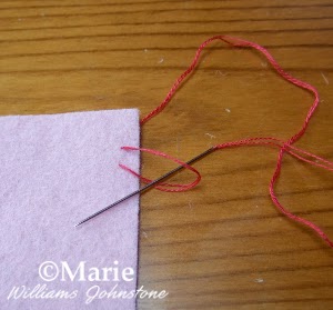 step 4 demonstrating hand sewing stitch