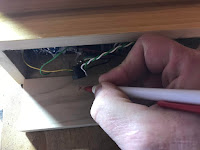 Marking the location for the power socket