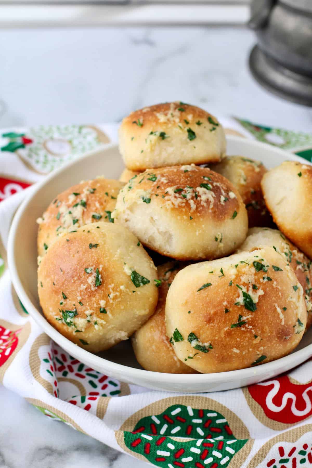 Garlic Parmesan Sourdough Dinner Rolls in a bowl for serving.