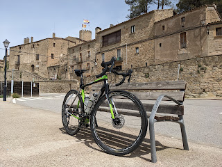 Bicycle in front of old stone village