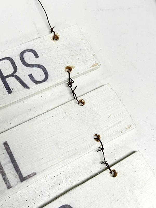 rusty wire connecting sign boards