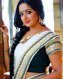 Kavya Madhavan saree seductive looks hd stills